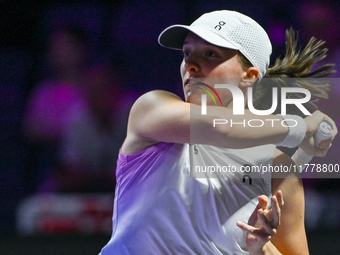 RIYADH, SAUDI ARABIA - NOVEMBER 05: Iga Swiatek of Poland during her match against Coco Gauff of USA, on day 4 of the 2024 WTA Finals, part...