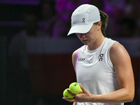 RIYADH, SAUDI ARABIA - NOVEMBER 05: Iga Swiatek of Poland during her match against Coco Gauff of USA, on day 4 of the 2024 WTA Finals, part...