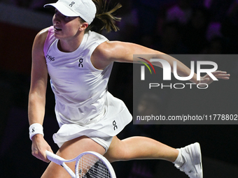 RIYADH, SAUDI ARABIA - NOVEMBER 05: Iga Swiatek of Poland during her match against Coco Gauff of USA, on day 4 of the 2024 WTA Finals, part...