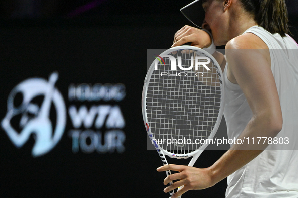 RIYADH, SAUDI ARABIA - NOVEMBER 05: Iga Swiatek of Poland during her match against Coco Gauff of USA, on day 4 of the 2024 WTA Finals, part...