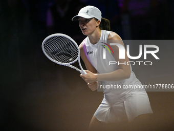 RIYADH, SAUDI ARABIA - NOVEMBER 05: Iga Swiatek of Poland during her match against Coco Gauff of USA, on day 4 of the 2024 WTA Finals, part...