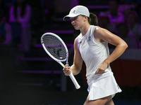 RIYADH, SAUDI ARABIA - NOVEMBER 05: Iga Swiatek of Poland during her match against Coco Gauff of USA, on day 4 of the 2024 WTA Finals, part...