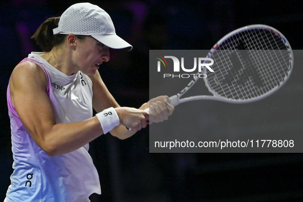 RIYADH, SAUDI ARABIA - NOVEMBER 05: Iga Swiatek of Poland during her match against Coco Gauff of USA, on day 4 of the 2024 WTA Finals, part...