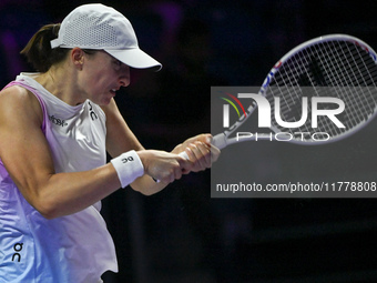 RIYADH, SAUDI ARABIA - NOVEMBER 05: Iga Swiatek of Poland during her match against Coco Gauff of USA, on day 4 of the 2024 WTA Finals, part...