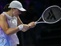 RIYADH, SAUDI ARABIA - NOVEMBER 05: Iga Swiatek of Poland during her match against Coco Gauff of USA, on day 4 of the 2024 WTA Finals, part...