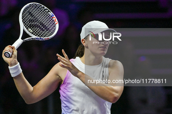 RIYADH, SAUDI ARABIA - NOVEMBER 05: Iga Swiatek of Poland during her match against Coco Gauff of USA, on day 4 of the 2024 WTA Finals, part...