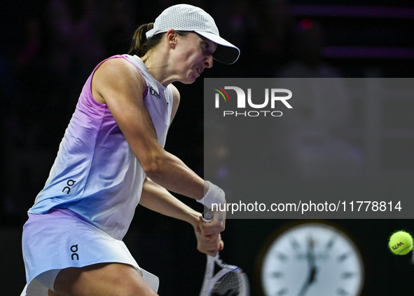 RIYADH, SAUDI ARABIA - NOVEMBER 05: Iga Swiatek of Poland during her match against Coco Gauff of USA, on day 4 of the 2024 WTA Finals, part...