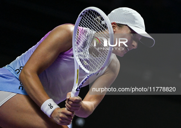 RIYADH, SAUDI ARABIA - NOVEMBER 05: Iga Swiatek of Poland during her match against Coco Gauff of USA, on day 4 of the 2024 WTA Finals, part...