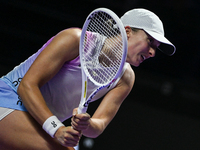 RIYADH, SAUDI ARABIA - NOVEMBER 05: Iga Swiatek of Poland during her match against Coco Gauff of USA, on day 4 of the 2024 WTA Finals, part...