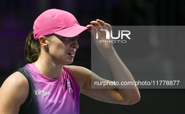 RIYADH, SAUDI ARABIA - NOVEMBER 07: Iga Swiatek of Poland during her match against Daria Kasatkina, on Day 6 of the 2024 WTA Finals, part of...