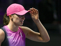 RIYADH, SAUDI ARABIA - NOVEMBER 07: Iga Swiatek of Poland during her match against Daria Kasatkina, on Day 6 of the 2024 WTA Finals, part of...