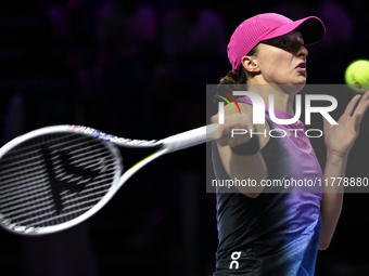 RIYADH, SAUDI ARABIA - NOVEMBER 07: Iga Swiatek of Poland during her match against Daria Kasatkina, on Day 6 of the 2024 WTA Finals, part of...