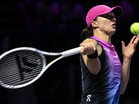 RIYADH, SAUDI ARABIA - NOVEMBER 07: Iga Swiatek of Poland during her match against Daria Kasatkina, on Day 6 of the 2024 WTA Finals, part of...