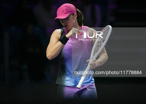 RIYADH, SAUDI ARABIA - NOVEMBER 07: Iga Swiatek of Poland during her match against Daria Kasatkina, on Day 6 of the 2024 WTA Finals, part of...