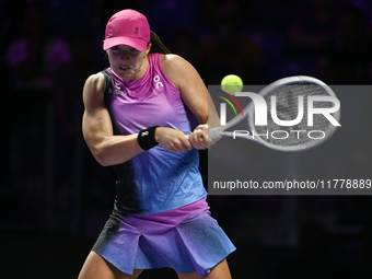 RIYADH, SAUDI ARABIA - NOVEMBER 07: Iga Swiatek of Poland during her match against Daria Kasatkina, on Day 6 of the 2024 WTA Finals, part of...