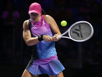 RIYADH, SAUDI ARABIA - NOVEMBER 07: Iga Swiatek of Poland during her match against Daria Kasatkina, on Day 6 of the 2024 WTA Finals, part of...