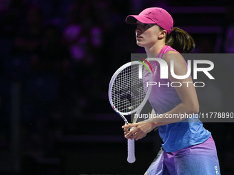 RIYADH, SAUDI ARABIA - NOVEMBER 07: Iga Swiatek of Poland during her match against Daria Kasatkina, on Day 6 of the 2024 WTA Finals, part of...