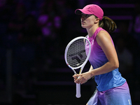 RIYADH, SAUDI ARABIA - NOVEMBER 07: Iga Swiatek of Poland during her match against Daria Kasatkina, on Day 6 of the 2024 WTA Finals, part of...