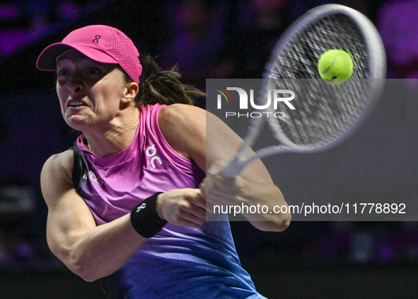 RIYADH, SAUDI ARABIA - NOVEMBER 07: Iga Swiatek of Poland during her match against Daria Kasatkina, on Day 6 of the 2024 WTA Finals, part of...