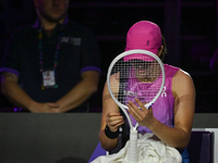 RIYADH, SAUDI ARABIA - NOVEMBER 07: Iga Swiatek of Poland during her match against Daria Kasatkina, on Day 6 of the 2024 WTA Finals, part of...