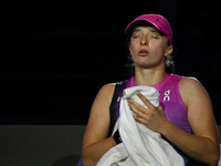 RIYADH, SAUDI ARABIA - NOVEMBER 07: Iga Swiatek of Poland during her match against Daria Kasatkina, on Day 6 of the 2024 WTA Finals, part of...