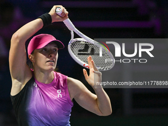 RIYADH, SAUDI ARABIA - NOVEMBER 07: Iga Swiatek of Poland during her match against Daria Kasatkina, on Day 6 of the 2024 WTA Finals, part of...