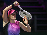 RIYADH, SAUDI ARABIA - NOVEMBER 07: Iga Swiatek of Poland during her match against Daria Kasatkina, on Day 6 of the 2024 WTA Finals, part of...