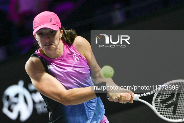 RIYADH, SAUDI ARABIA - NOVEMBER 07: Iga Swiatek of Poland during her match against Daria Kasatkina, on Day 6 of the 2024 WTA Finals, part of...