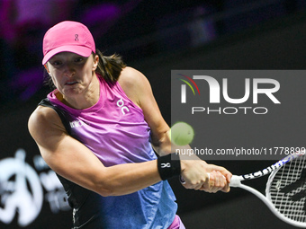 RIYADH, SAUDI ARABIA - NOVEMBER 07: Iga Swiatek of Poland during her match against Daria Kasatkina, on Day 6 of the 2024 WTA Finals, part of...