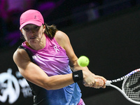 RIYADH, SAUDI ARABIA - NOVEMBER 07: Iga Swiatek of Poland during her match against Daria Kasatkina, on Day 6 of the 2024 WTA Finals, part of...