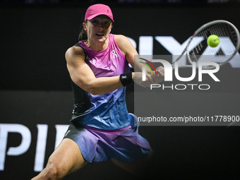 RIYADH, SAUDI ARABIA - NOVEMBER 07: Iga Swiatek of Poland during her match against Daria Kasatkina, on Day 6 of the 2024 WTA Finals, part of...