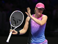 RIYADH, SAUDI ARABIA - NOVEMBER 07: Iga Swiatek of Poland during her match against Daria Kasatkina, on Day 6 of the 2024 WTA Finals, part of...