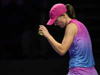 RIYADH, SAUDI ARABIA - NOVEMBER 07: Iga Swiatek of Poland during her match against Daria Kasatkina, on Day 6 of the 2024 WTA Finals, part of...