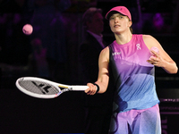 RIYADH, SAUDI ARABIA - NOVEMBER 07: Iga Swiatek of Poland celebrates after winning her match against Daria Kasatkina, on Day 6 of the 2024 W...