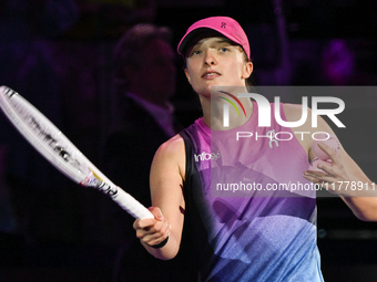 RIYADH, SAUDI ARABIA - NOVEMBER 07: Iga Swiatek of Poland celebrates after winning her match against Daria Kasatkina, on Day 6 of the 2024 W...