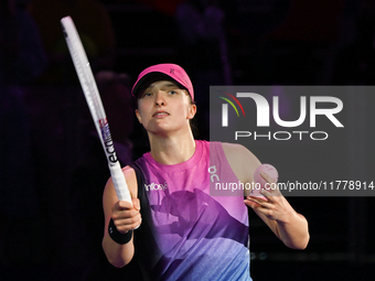 RIYADH, SAUDI ARABIA - NOVEMBER 07: Iga Swiatek of Poland celebrates after winning her match against Daria Kasatkina, on Day 6 of the 2024 W...