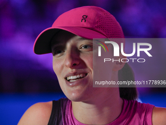 RIYADH, SAUDI ARABIA - NOVEMBER 07: Iga Swiatek of Poland speaks to the media after winning her match against Daria Kasatkina, on Day 6 of t...