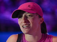 RIYADH, SAUDI ARABIA - NOVEMBER 07: Iga Swiatek of Poland speaks to the media after winning her match against Daria Kasatkina, on Day 6 of t...