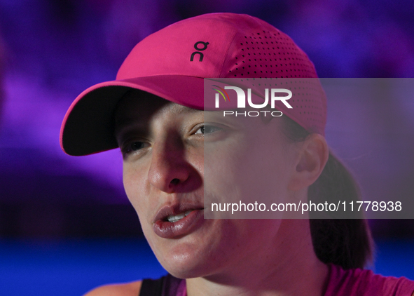 RIYADH, SAUDI ARABIA - NOVEMBER 07: Iga Swiatek of Poland speaks to the media after winning her match against Daria Kasatkina, on Day 6 of t...