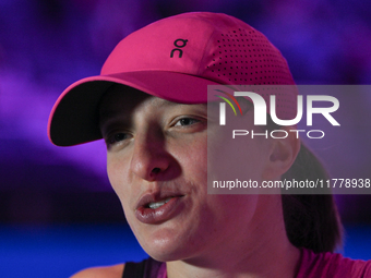 RIYADH, SAUDI ARABIA - NOVEMBER 07: Iga Swiatek of Poland speaks to the media after winning her match against Daria Kasatkina, on Day 6 of t...