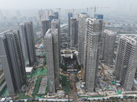 A Vanke property is under construction in Nanjing, Jiangsu province, China, on November 15, 2024. On November 15, 2024, the National Bureau...