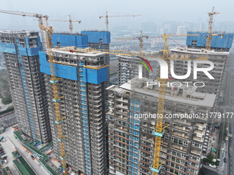 A building under construction by C&D Group is in Nanjing, China, on November 15, 2024. On November 15, 2024, the National Bureau of Statisti...