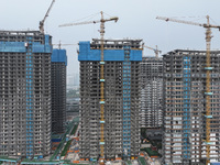 A building under construction by C&D Group is in Nanjing, China, on November 15, 2024. On November 15, 2024, the National Bureau of Statisti...