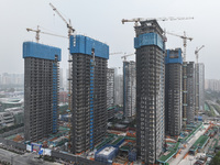 A building under construction by C&D Group is in Nanjing, China, on November 15, 2024. On November 15, 2024, the National Bureau of Statisti...