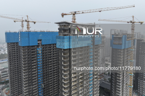 A building under construction by C&D Group is in Nanjing, China, on November 15, 2024. On November 15, 2024, the National Bureau of Statisti...