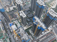 A building under construction by C&D Group is in Nanjing, China, on November 15, 2024. On November 15, 2024, the National Bureau of Statisti...