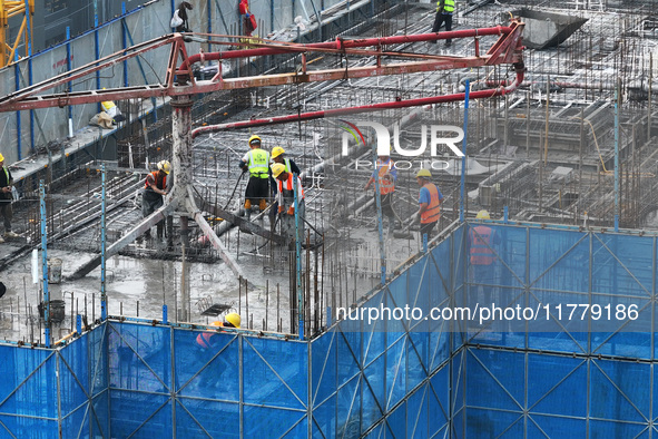 A building under construction by C&D Group is in Nanjing, China, on November 15, 2024. On November 15, 2024, the National Bureau of Statisti...