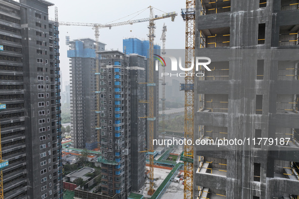 A building under construction by C&D Group is in Nanjing, China, on November 15, 2024. On November 15, 2024, the National Bureau of Statisti...