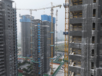 A building under construction by C&D Group is in Nanjing, China, on November 15, 2024. On November 15, 2024, the National Bureau of Statisti...