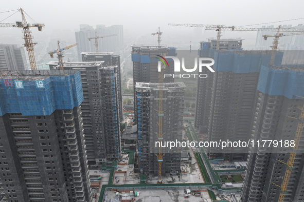 A building under construction by C&D Group is in Nanjing, China, on November 15, 2024. On November 15, 2024, the National Bureau of Statisti...